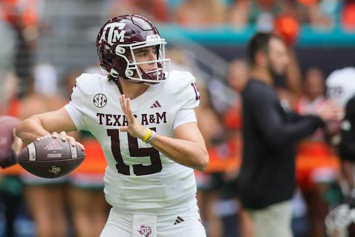 Sep 9, 2023; Miami Gardens, Florida, USA; Texas A&M Aggies quarterback Conner Weigman (15) throws the football during warmups prior to the game against the Miami Hurricanes at Hard Rock Stadium. Mandatory Credit: Sam Navarro-USA 